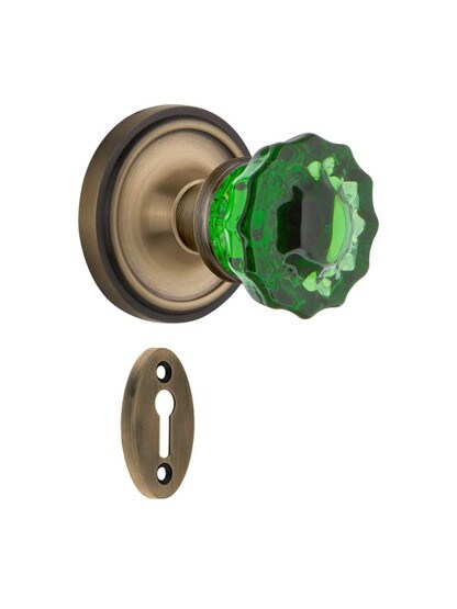 Classic Rosette Mortise Lock Set with Colored Fluted Crystal Glass Knobs Emerald in Antique Brass.